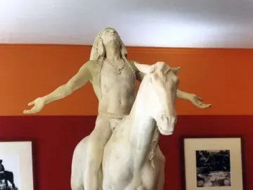 Appeal to the Great Spirit sculpture of a rider on a horse with arms outstretched and head tilted upward