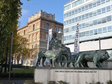 Marc Anton Group bronze sculpture of a seated figure in a chariot pulled by lions