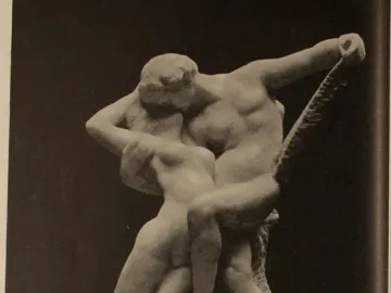 The Eternal Springtime sculpture by Auguste Rodin showing two nude figures in an embrace on a rough-textured base.