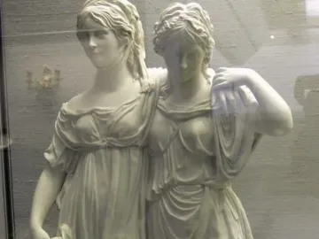 Princesses Monument showing two women in flowing classical drapery, one resting her arm on the other’s shoulder.