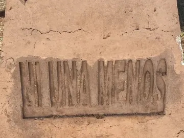 Close-up of the Antimonumenta base with the phrase \