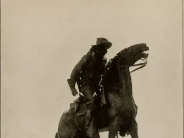 Buckey O\'Neill Monument showing an equestrian bronze statue of a man in a wide-brimmed hat on a rearing horse atop a stone pedestal.