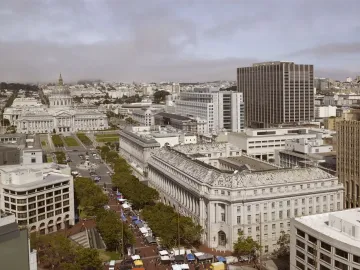 Pioneer Monument at a San Francisco street intersection, with a domed building in the background.