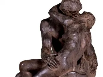 The Kiss sculpture showing a nude man and woman embracing and kissing