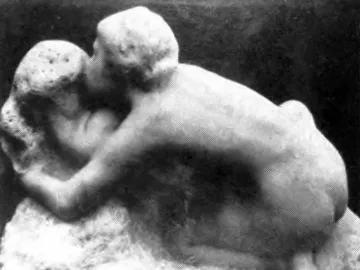 Metamorphoses by Auguste Rodin, showing two intertwined figures in a monochrome sculpture.
