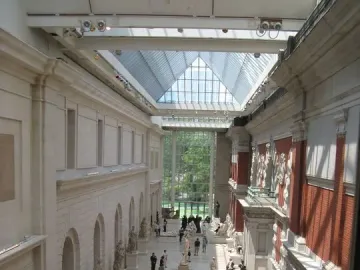 Ugolino and His Sons, a large stone sculpture of intertwined male figures in a museum hall.