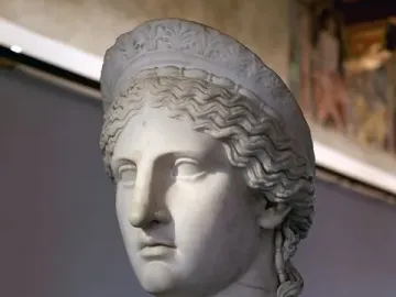 Juno Ludovisi marble bust with wavy hair and a decorative headband.