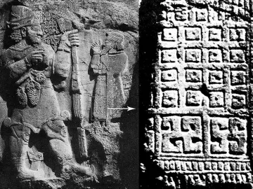 The Ivriz relief showing a bearded figure in a tall hat holding a staff and grapes beside a smaller figure, with a detailed inset of patterned carving.