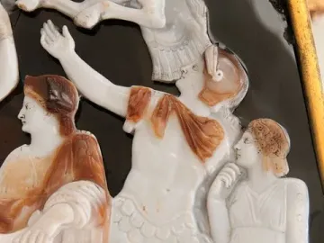 Right section of the Great Cameo of France showing carved relief figures, including an armored central figure and part of an animal.