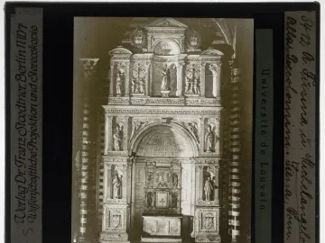 The Piccolomini Altarpiece with ornate architectural carving, niches of statues, and a smaller altar at the base.