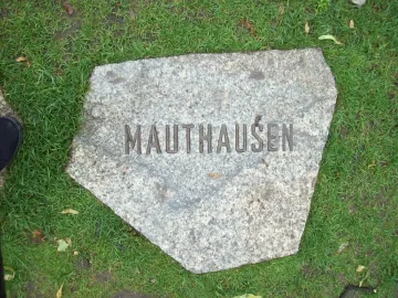 Light grey stone slab inscribed with \
