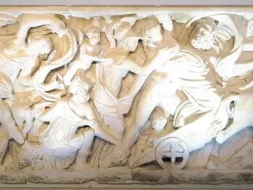 Proserpina Sarcophagus with a high-relief marble carving of a dramatic mythological scene with horses, a chariot, and a serpent.