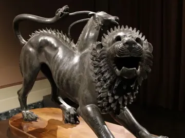 Bronze Chimera of Arezzo with a lion’s body, a goat’s head on its back, and a raised snake tail.