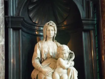 Madonna of Bruges marble sculpture of a seated woman holding the infant Jesus