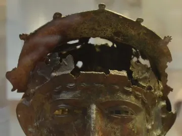 Corroded Ribchester Helmet with a sculpted face mask and damaged open crown