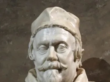 Marble bust of Pope Clement X with a book and raised hand, featuring a scroll inscribed \