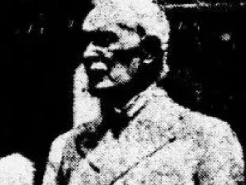 Marble bust of Abraham Lincoln in a double-breasted coat, facing slightly left.
