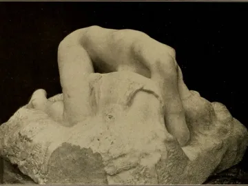 Rodin\'s Danaid shown in a sepia-toned photograph, with a smooth human figure emerging from a rough textured base.