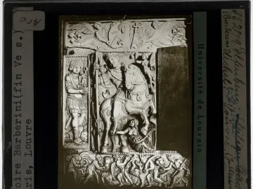 Barberini Ivory panel showing an emperor on horseback with a spear, flanked by figures and topped by winged figures around a bust of Christ.