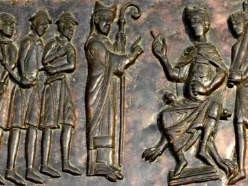 Gniezno Doors relief showing a bishop facing a group of men, with a crowned ruler seated at right and an armed guard nearby.