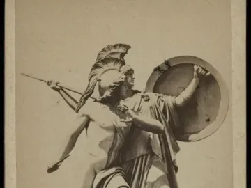 Marble sculpture group of Athena Protects the Young Hero, with a helmeted figure holding a shield behind a young warrior with a spear.