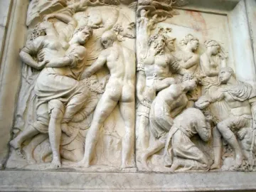 Marble relief from Giovanni delle Bande Nere monument showing classical figures in struggle and supplication.