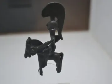 Warrior of Moixent bronze horseman statuette with a crested helmet and round shield.