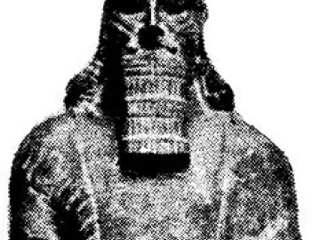 Statue of Ashurnasirpal II shown as a full-length bearded figure in patterned garments, holding a dagger across the chest.