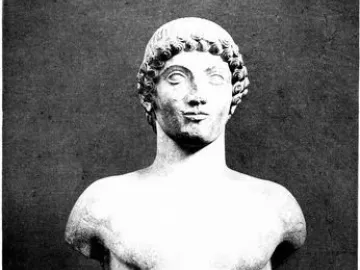 Apollo Strangford, a broken marble statue of a young male figure with missing arms and lower legs.