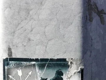Sticker showing a silhouette of Bohdan Khmelnytsky on horseback with Cyrillic text on a grey surface.