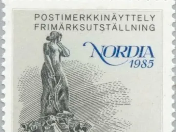 Havis Amanda statue on a Finnish postage stamp with water spouting from marine animals at the base.