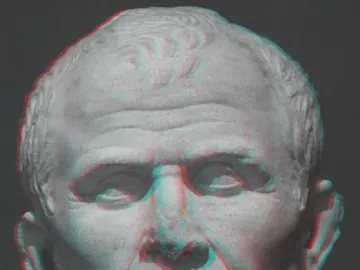 Classical marble bust of Julius Caesar with a red-cyan anaglyph effect against a dark gray background.