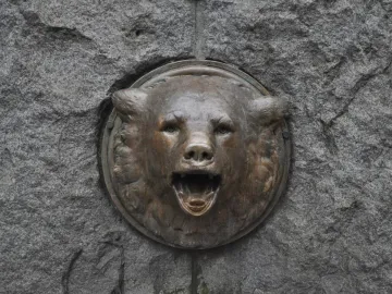 Bronze bear head fountain detail on the Chief Seattle monument pedestal
