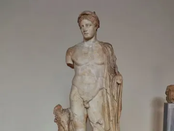 Hermes Criophorus marble statue with a ram beside his leg