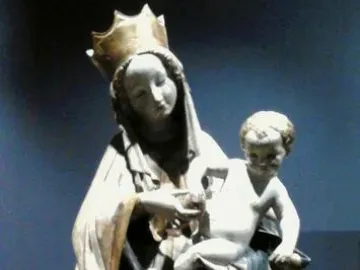Beautiful Madonna of Wrocław, a crowned woman holding a child with flowing drapery