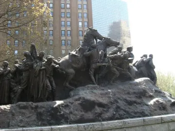 Wars of America bronze sculpture with mounted and foot figures on a dark base