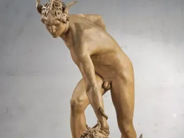 Perseus and the Gorgon sculpture showing a nude Perseus with a winged helmet standing over Medusa.
