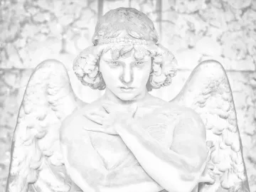 Monteverde Angel stone sculpture with feathered wings and crossed hands