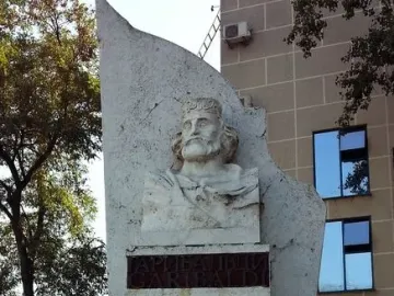 Garibaldi Monument with a bust of a bearded man and a plaque reading GARIBALDI.