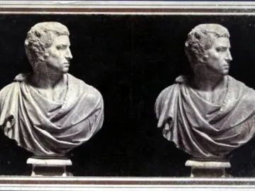 Stereo card showing Michelangelo\'s Brutus bust in profile against a dark background.