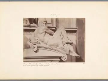Michelangelo\'s Day sculpture on the tomb of Giuliano de\' Medici, shown in a sepia photograph from the back.