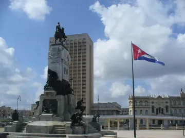 Antonio Maceo Monument with a bronze equestrian statue atop a decorated stone base and reliefs.