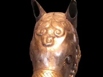 Sassanian Horse Head sculpture with silver metal and gold-gilded details.
