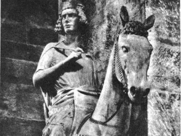 The Bamberg Horseman stone statue shows a crowned rider on a horse, facing left.