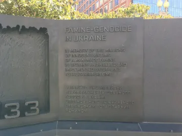 Holodomor Memorial wall with engraved inscription reading \
