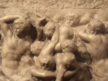 Battle of the Centaurs marble relief showing a dense struggle of nude, muscular figures