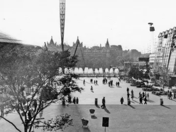 The Skylon stands as a tall, slender latticework sculpture against the sky.