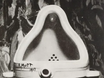 Black-and-white photograph of Duchamp’s Fountain, a ceramic urinal signed R. Mutt 1917.