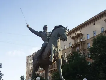 Pyotr Bagration Monument, an equestrian statue on a tall granite pedestal in a city square.