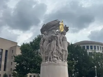 George Gordon Meade Memorial with sculpted figures, a golden emblem, and the name MEADE on the base.